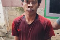 Pelaku ketika diamankan Polisi. Foto:Dok/Polsek Sekupang