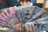 Ilustrasi rupiah dan dolar AS.