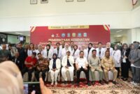 Rudi-Aunur tiba lebih awal menjalani tes kesehatan. Foto:Istimewa