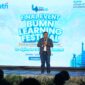 Deputi Bidang Sumber Daya Manusia, Teknologi, dan Informasi Kementerian BUMN Tedi Bharata memberikan sambutan dalam acara puncak BUMN Learning Festival 2024. Telkom dinobatkan sebagai The Most Outstanding BUMN Learning. Foto:Telkom