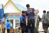 Warga yang pindah ke rumah baru. Foto;Humas BP