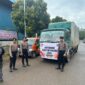 Anggota Polresta Barelang melakukan pengawalan distribusi logistik pemilu dari gudang KPU di Sekupang ke beberapa wilayah di Kota Batam, Minggu (24/11/2024). Matapedia6.com/ Dok Humas Polresta Barelang
