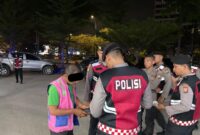 Salah satu juru parkir liar ditangkap polisi. Foto:Dok/Humas Polda