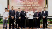 Komisi Pemilihan Umum (KPU) Provinsi tetapkan Ansar Ahmad-Nyanyang Haris Pratamura sebagai pemenang di Pilgub Kepri 2024. Penetapan dilaksanakan di di TCC Aston Hotel Tanjungpinang, Kamis (9/1/2025). Matapedia6.com/ Diskominfo Kepri