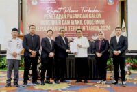 Komisi Pemilihan Umum (KPU) Provinsi tetapkan Ansar Ahmad-Nyanyang Haris Pratamura sebagai pemenang di Pilgub Kepri 2024. Penetapan dilaksanakan di di TCC Aston Hotel Tanjungpinang, Kamis (9/1/2025). Matapedia6.com/ Diskominfo Kepri