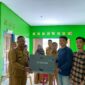 Panitia HPN serahkan bantuan internet. Foto:Dok/Ist