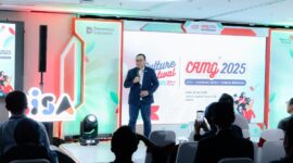 Direktur Human Capital Management Telkom Henry Christiadi dalam acara Culture Festival TelkomGroup 2025 yang mengusung tema 