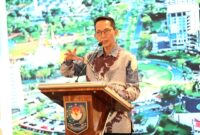 Wali Kota Batam sekaligus Kepala BP Batam Amsakar Achmad saat memaparkan strategi tata kelola keuangan daerah serta penguatan BUMD demi mendorong pertumbuhan ekonomi yang berkelanjutan di Japan Indonesia Local Administration Seminar 2025  di Mandarin Oriental Hotel Jakarta, Kamis (25/9/2025). Matapedia6.com/Diskominfo