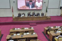 Ketua DPRD Kota Batam Muhammad Kamaluddin saat memimpin Rapat Paripurna penyampaian tanggapan wali Kota Batam atas Ranperda LAM Kota Batam, di ruang Sidang Utama DPRD Kota Batam, Rabu (14/1/2026). Matapedia6.com/Luci