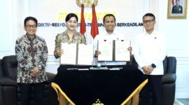OJK bersama Bareskrim tanda tangan MoU kerja sama. Foto:OJK Kepri