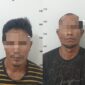 Kedua tersangka saat diamankan di Polsek Sagulung. Foto:Ist