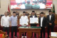 Wali Kota Batam Amsakar Achmad dan Waki Ketua I DPRD Kota Batam Aweng Kurniawan. Foto:Istimewa