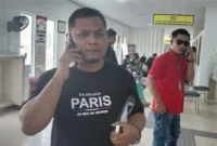 Rahmat Purba saat membuat laporan ke polisi. Foto:Istimewa